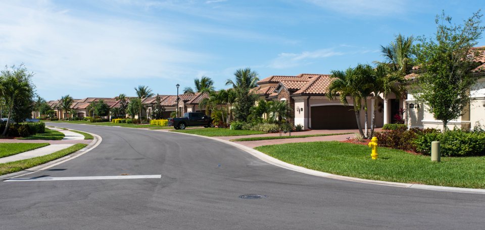 A street of single-family houses in a residential neighborhood