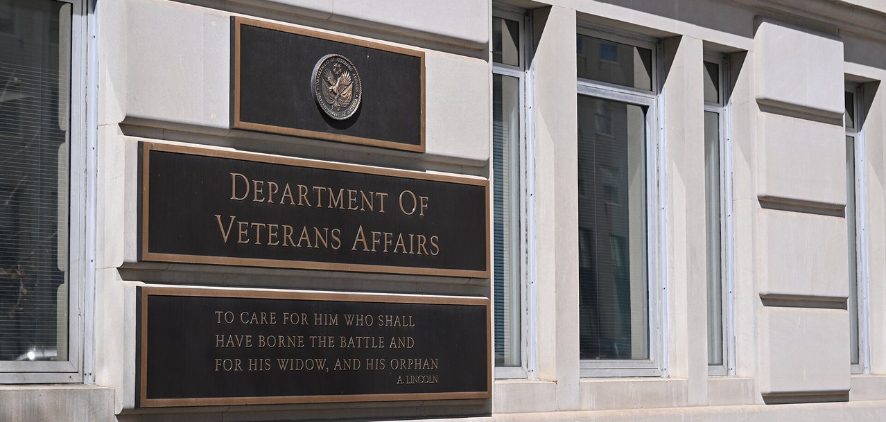 Bronze plaques at the Department of Veterans Affairs headquarters, carrying the Lincoln inscription about the widow and the orphan